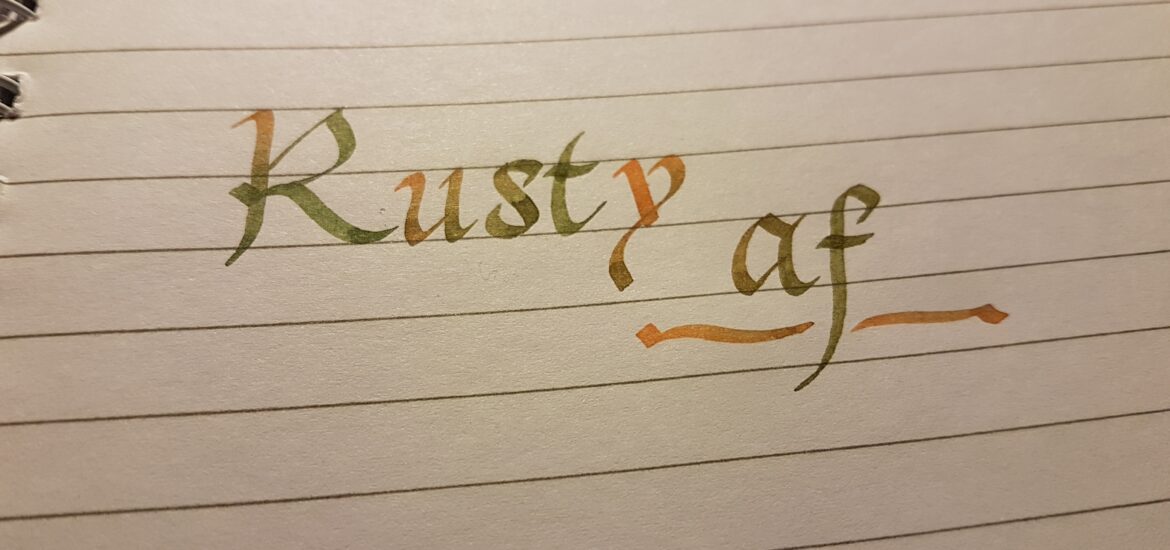 Image of lined paper with the words Rusty A F written in calligraphy