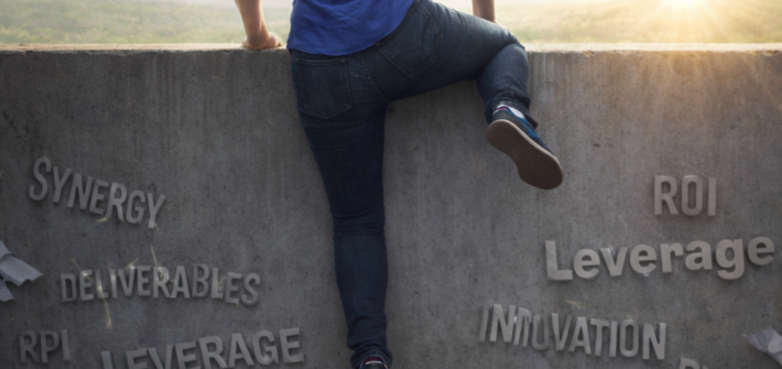 AI image of a woman climbing over a wall which is covered in business buzzwords